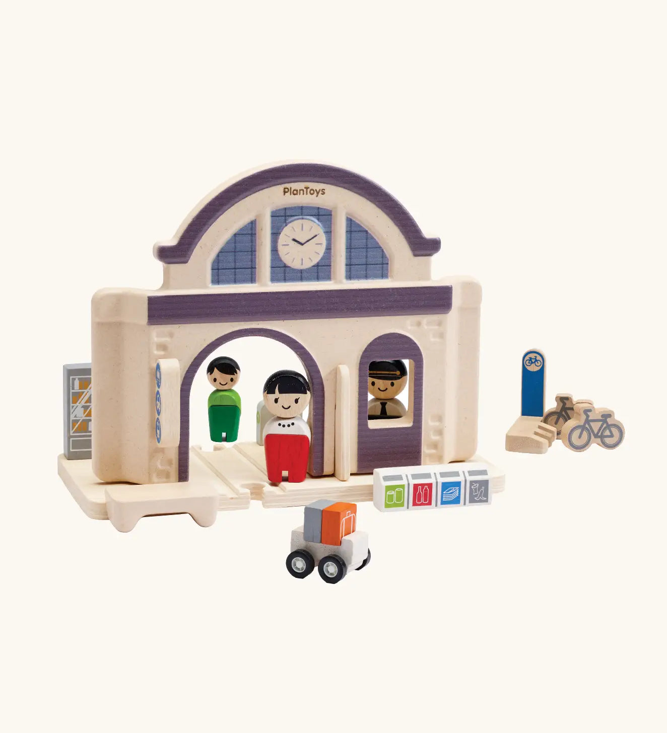 PlanToys wooden train station. A add on expansion set for a PlanToys rail set. Features wooden people figures, trolleys and bikes