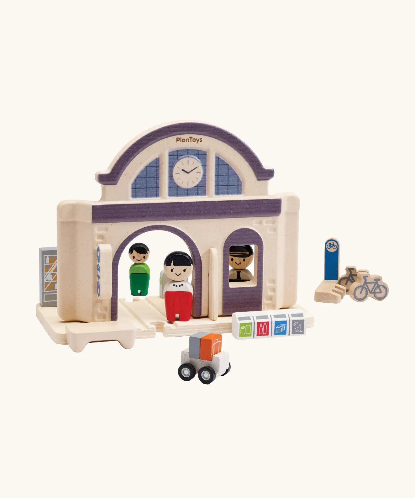 PlanToys wooden train station. A add on expansion set for a PlanToys rail set. Features wooden people figures, trolleys and bikes