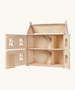 PlanToys wooden Victorian dolls house. with the front of the top and bottom floor open showing the staircase