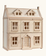 PlanToys wooden Victorian dolls house. A 3 floor house with working windows and doors 