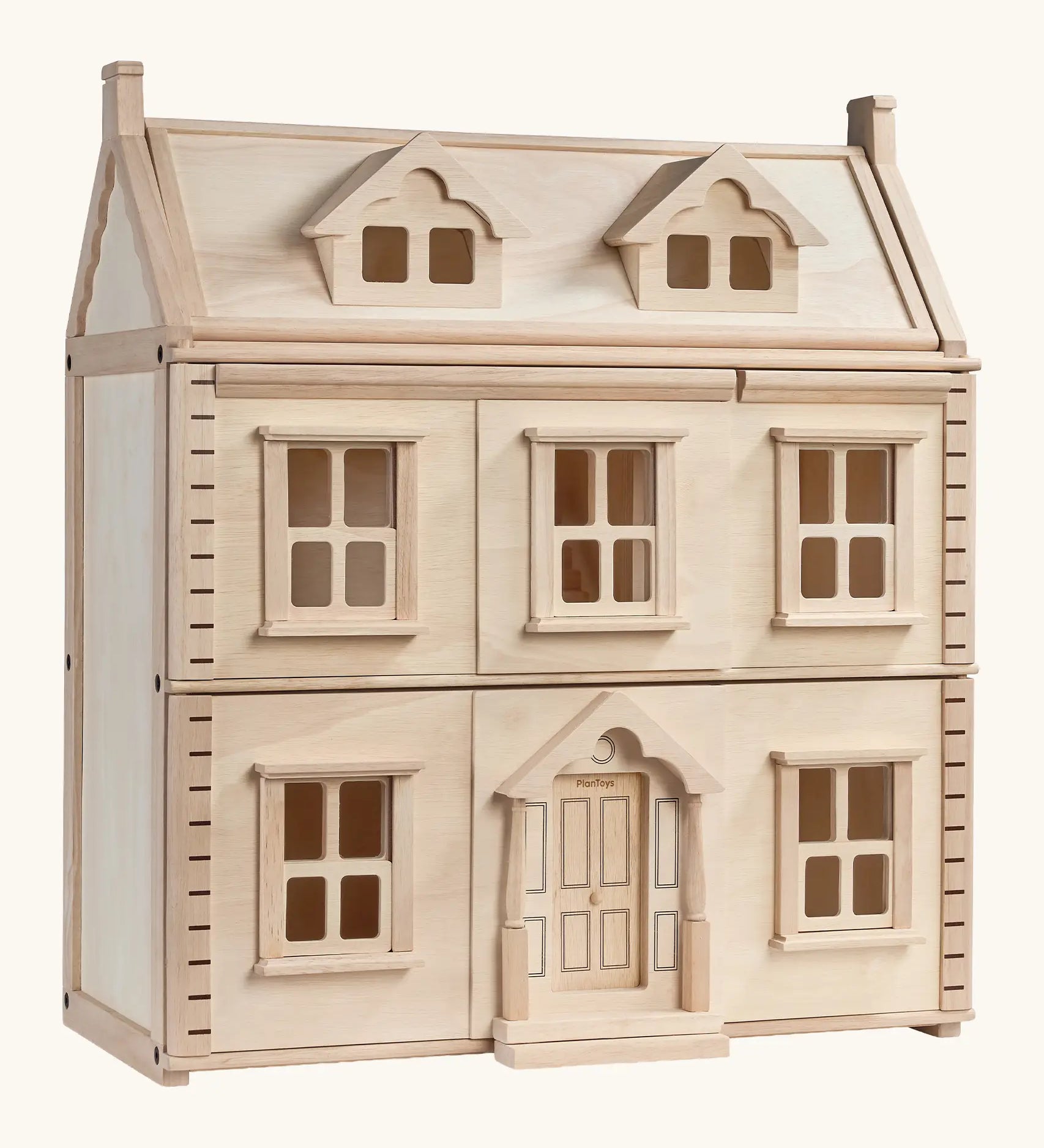 PlanToys wooden Victorian dolls house. A 3 floor house with working windows and doors 