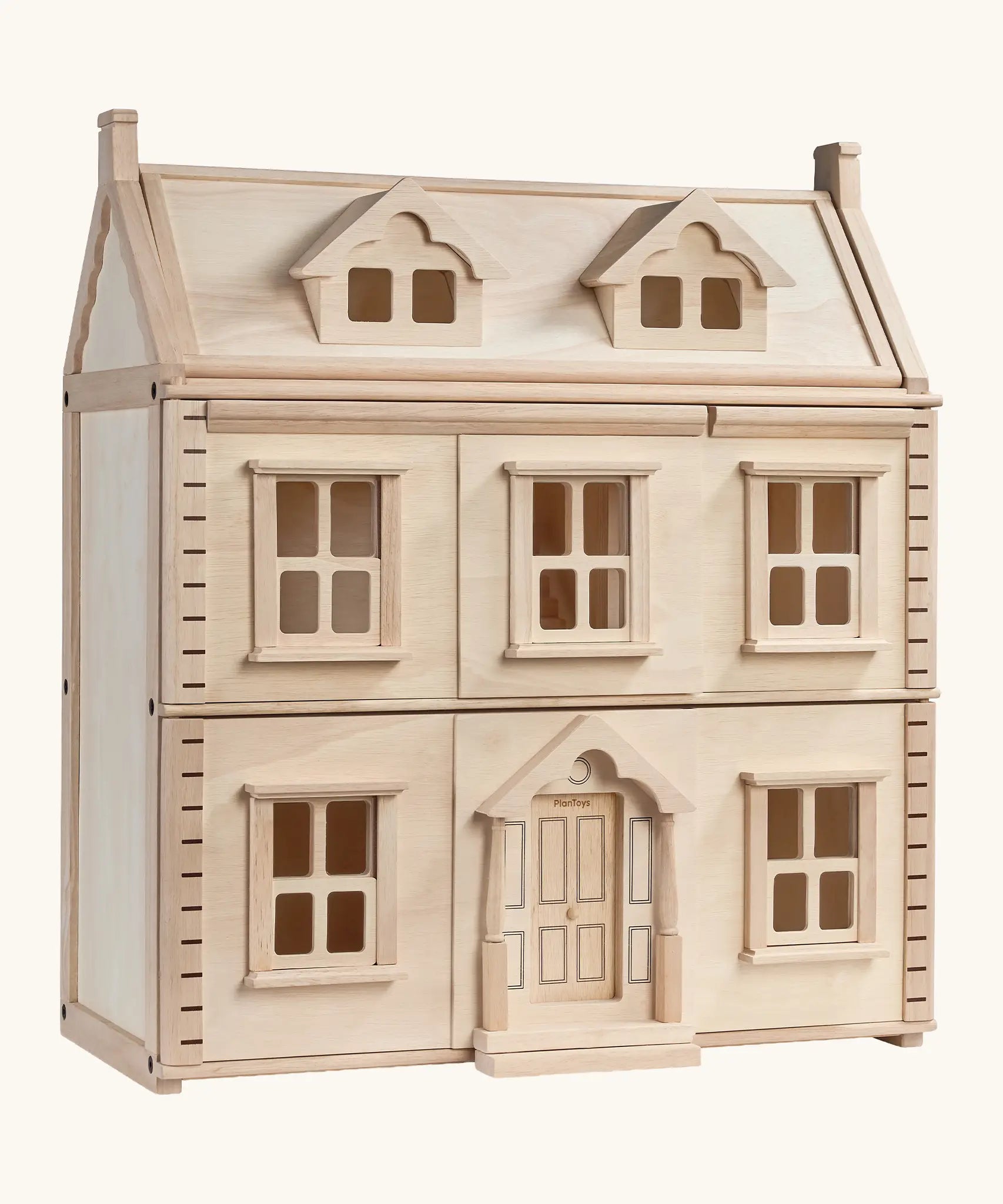 PlanToys wooden Victorian dolls house. A 3 floor house with working windows and doors 