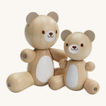 PlanToys Bear & Little Bear, is an adorable pair of bears made from wood, and perfect for babies and little ones. In this set is a big bear and a little bear, perfect for role play or play in general. Each bear has movable arms and legs, a white patch on their tummy and a happy, smiling face. The image is on a cream background