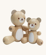 PlanToys Bear & Little Bear, is an adorable pair of bears made from wood, and perfect for babies and little ones. In this set is a big bear and a little bear, perfect for role play or play in general. Each bear has movable arms and legs, a white patch on their tummy and a happy, smiling face. The image is on a cream background