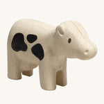 The PlanToys Cow is an adorable farm yard toy for little ones. Made from PlanWood, this cow is white with black spots, and is on a cream background