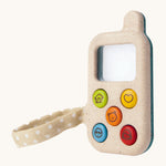 PlanToys My First Phone is a fun and interactive, sensory toy for babies and toddlers. The phone comes with 5 colourful buttons on the front, each with a cute illustration. There is also a magnifying glass square above the buttons so little ones can explore their wold in more detail. The image is on a cream background