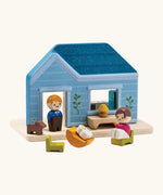 PlanToys wooden blue house with small furniture and figures