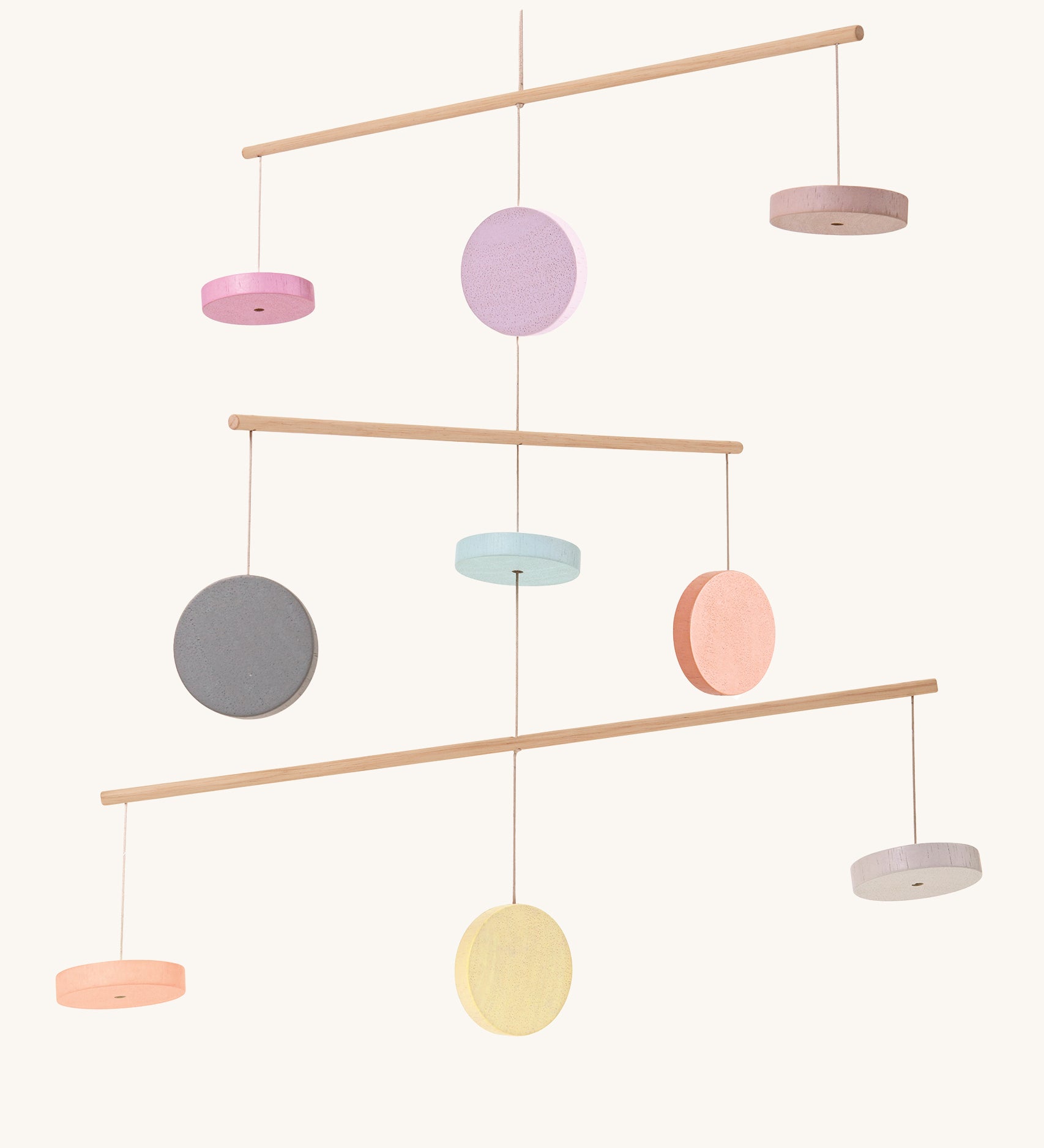 The PlanToys Mobile is a beautiful addition to any bedroom or playroom. With 9 colourful wooden disks strung between 3 different levels, on a cream background