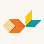 A fish made from the shapes of the PlanToys Mini Mosaic Blocks, on a cream background