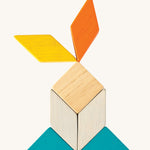 A rabbit made from the shapes of the PlanToys Mini Mosaic Blocks, on a cream background
