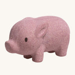 The PlanToys Pig is an adorable farm yard toy for little ones. Made from PlanWood, this pig is pink with black eyes, and is on a cream background