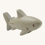The PlanToys Shark is an adorable sea life toy for little ones. Made from PlanWood, this shark is grey with brown eyes, brown lines for gills, and is on a cream background