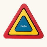 overhead view of the PlanToys nesting triangle wooden toy. 