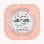 Poppets Grande Reusable Baby Wipes Container in Peach. The container is in a square shape on a cream background