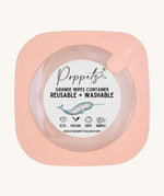 Poppets Grande Reusable Baby Wipes Container in Peach. The container is in a square shape on a cream background