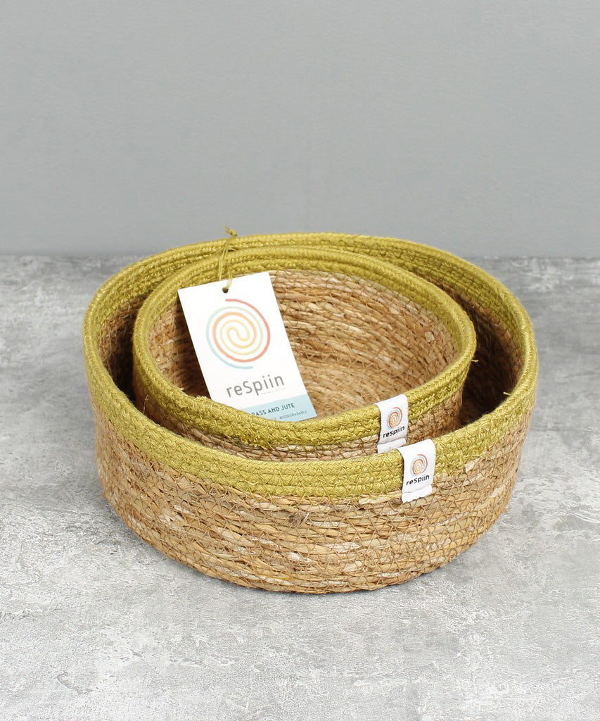 Respiin set of 2 natural shallow seagrass jute baskets with green rim with the small basket inside the medium basket