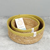 Respiin set of 2 natural shallow seagrass jute baskets with green rim with the small basket inside the medium basket