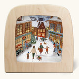Toverlux silhouette of a Christmas shopping scene on a snowy winter evening, for November and December celebrations.