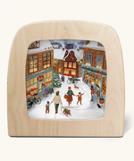 Toverlux silhouette of a Christmas shopping scene on a snowy winter evening, for November and December celebrations.