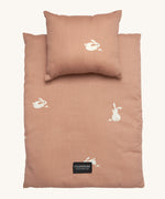 Roommate Doll Bedding Set - Rabbit in a pale pink colour with adorable rabbit print. The image shows a blanket and a pillow, on a cream background
