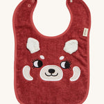 Roommate Organic Cotton Baby Bib - Red Panda, is a flannel style bib with a cute red panda face, interactive panda ears, and a metal popper fastener to close the bib behind the neck. The image is on a cream background