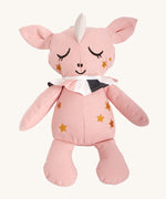 Roommate Canvas Doll Uni The Unicorn, is made from pink organic cotton and as a white unicorn horn, gold embroidered stars on its face and body, sleepy embroidered eyes and a pink, white and dark grey collar round its neck. On a cream background