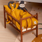 Two Roommate teddies inside a dolls bed, cuddled up under the Roommate Doll Bedding Set - Tiger