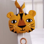 Roommate Tiger Music Mobile on a white crib.