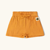 Little Green Radicals golden ochre kids shorts organic cotton shorts.