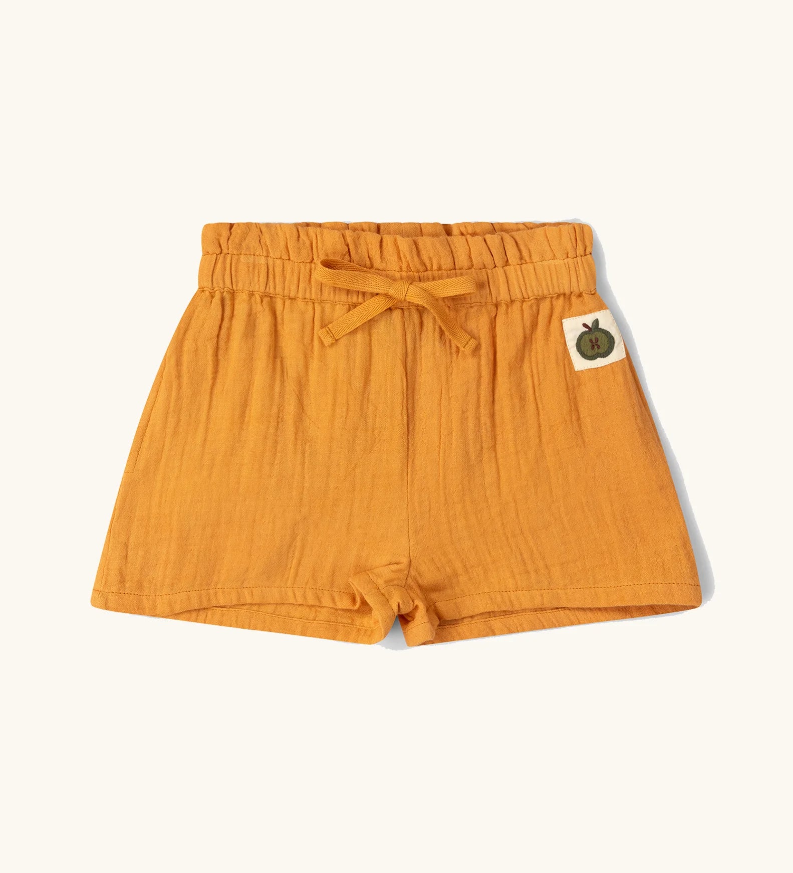 Little Green Radicals golden ochre kids shorts organic cotton shorts.