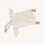 Senger Stone Pine Pillow - Goose with a white square body, white face, wings and tail, and light brown feet and beak on a cream background