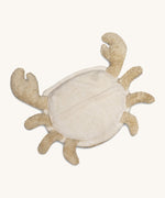 Underside of the Senger Naturwelt small cuddly crab in a light beige colour showing the zip opening for the heat cushion. Organic GOTS cotton plush soft toy with natural wool filling and spelt husk heat cushion.