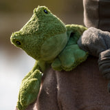Senger Naturwelt Small Cuddly Frog soft toy, made from organic cotton, in child's arms.