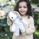 Senger Floppy Dog Small, made from organic cotton and filled with sheep's wool, white body with light brown ears and feet.