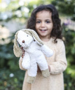 Senger Floppy Dog Small, made from organic cotton and filled with sheep's wool, white body with light brown ears and feet.