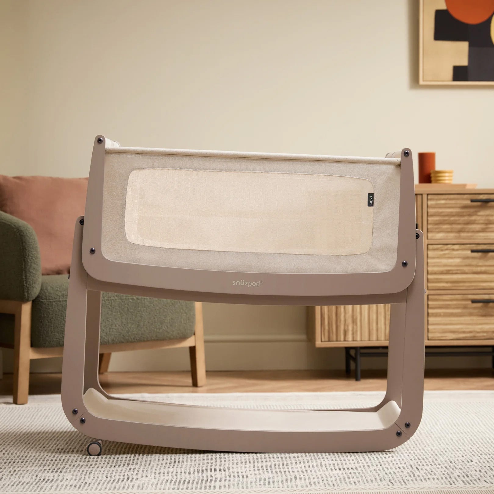 The SnuzPod5 with only 2 of its 4 wheels attached, to show the 'comfort incline mode'.