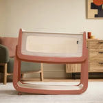 The SnuzPod5 in Terracotta with only 2 of its 4 wheels attached, to show the 'comfort incline mode'.
