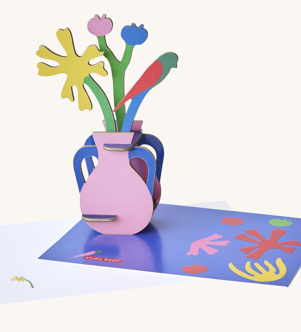 Studio roof  Matisse Paper Bloom inspired bouquet 3D pop out card standing next to a matching greetings card