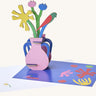 Studio roof  Matisse Paper Bloom inspired bouquet 3D pop out card standing next to a matching greetings card