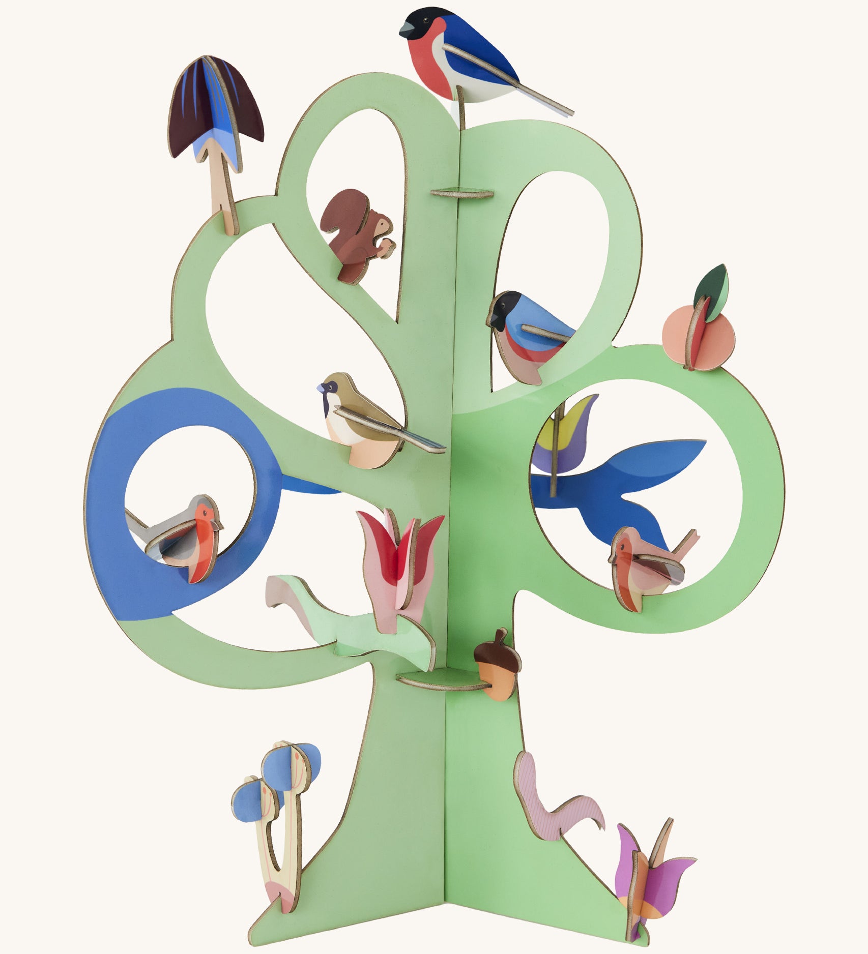 Studio roof singing tree from the capsule collection available at Babipur. A green tree decoration with different garden birds 