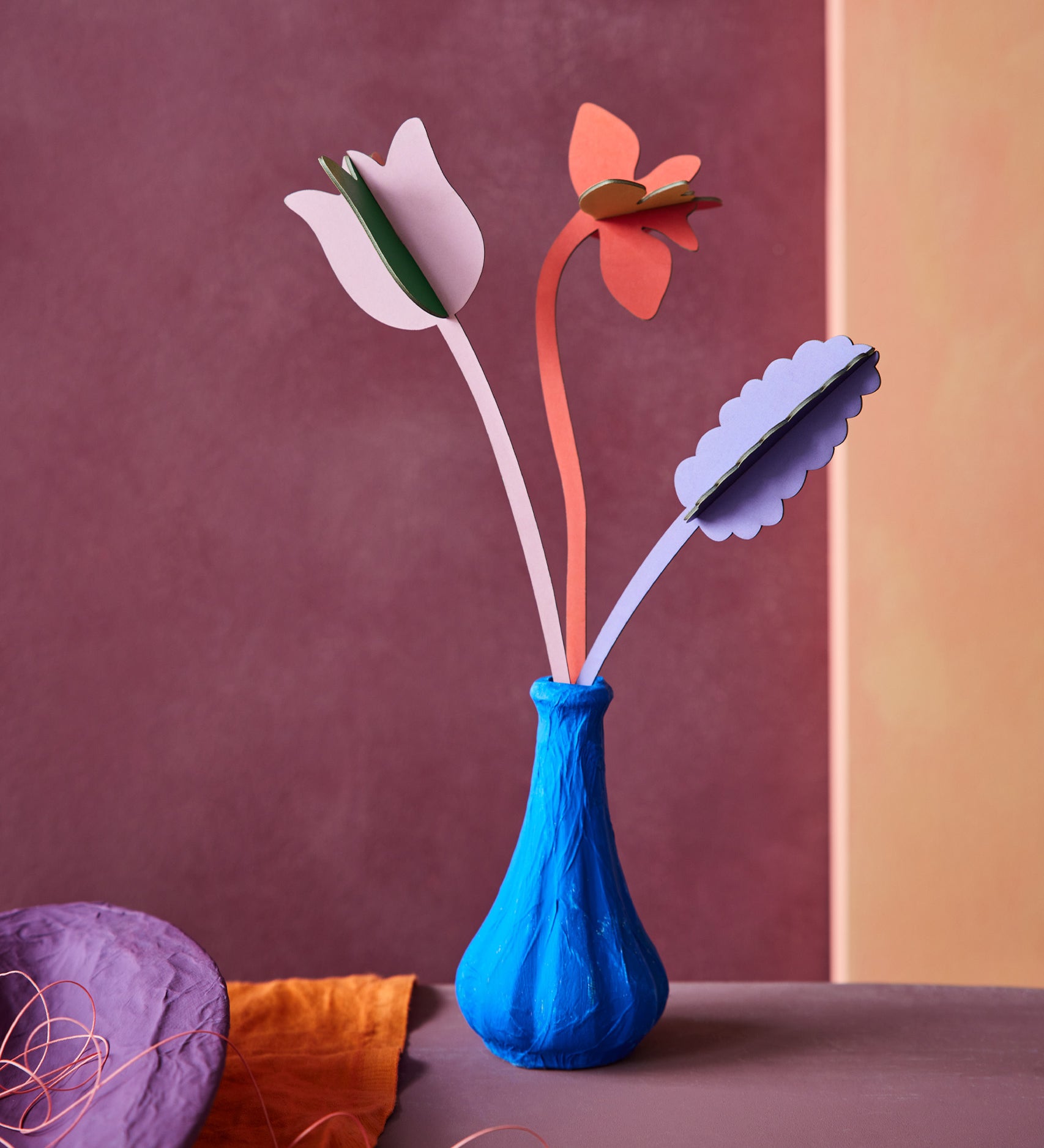Studio Roof cardboard bouquet in Spring time surprise colour way available at Babipur. A DIY kit made from cardboard displayed in a homemade paper mache vase 