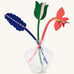 Studio Roof cardboard bouquet in Spring time surprise colour way available at Babipur. A DIY kit made from cardboard in a shape of different coloured flowers displayed in a glass vase