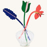 Studio Roof cardboard bouquet in Spring time surprise colour way available at Babipur. A DIY kit made from cardboard in a shape of different coloured flowers displayed in a glass vase