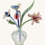 Studio Roof Cardboard Bouquet - William Morris on a cream background. The image shows a round glass vase with the William Morris Bouquet inside