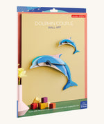 The cardboard packaging for the dolphin couple family wall decoration available at Babipur.