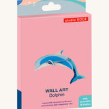 The cardboard packaging for the dolphin family wall decoration available at Babipur.