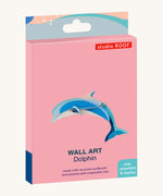 The cardboard packaging for the dolphin family wall decoration available at Babipur.