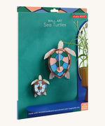 The cardboard packaging for the sea turtles wall decoration available at Babipur.