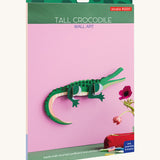 The cardboard packaging for the tall crocodile wall decoration available at Babipur.