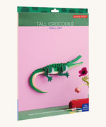 The cardboard packaging for the tall crocodile wall decoration available at Babipur.